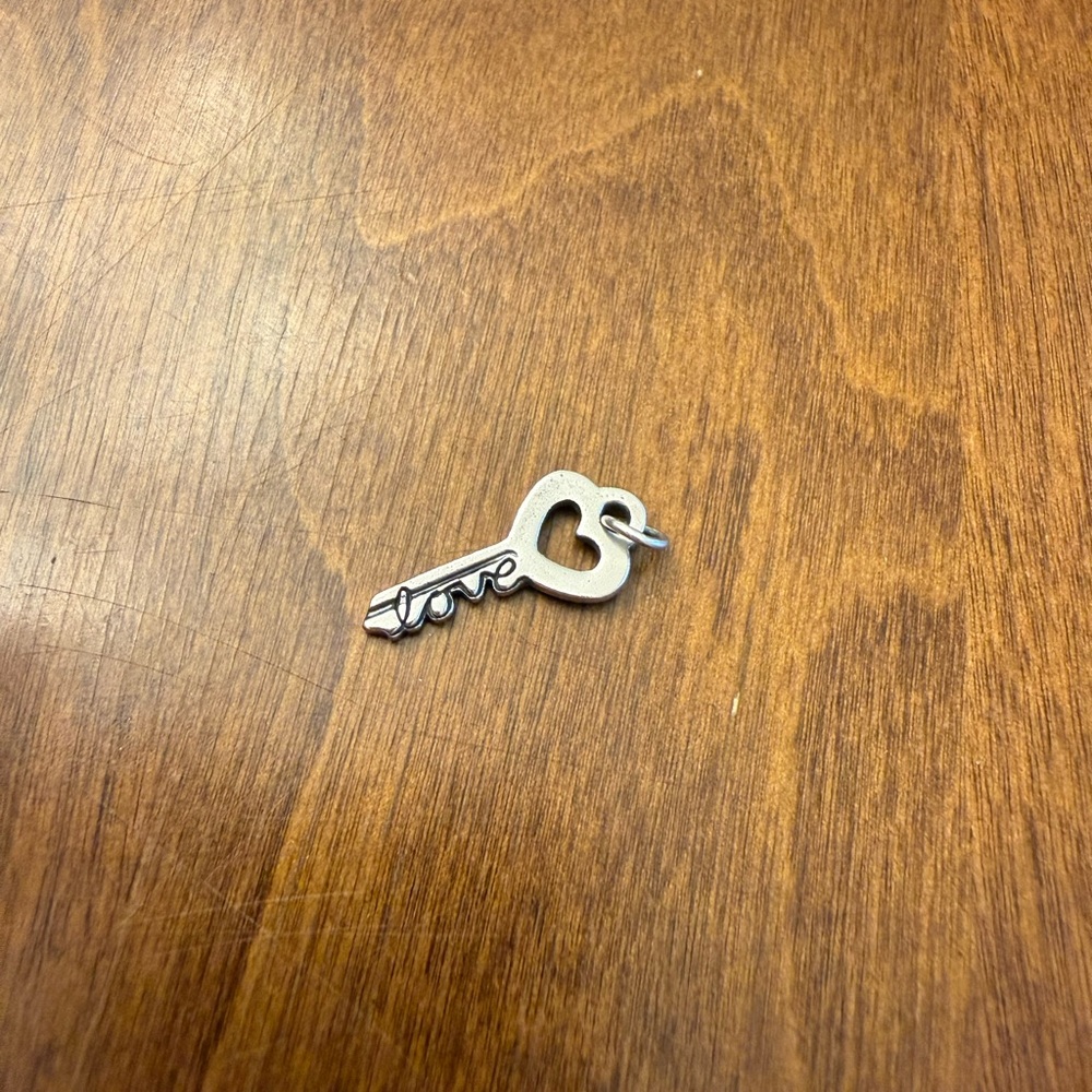Retired-James Avery Key of Love Charm
